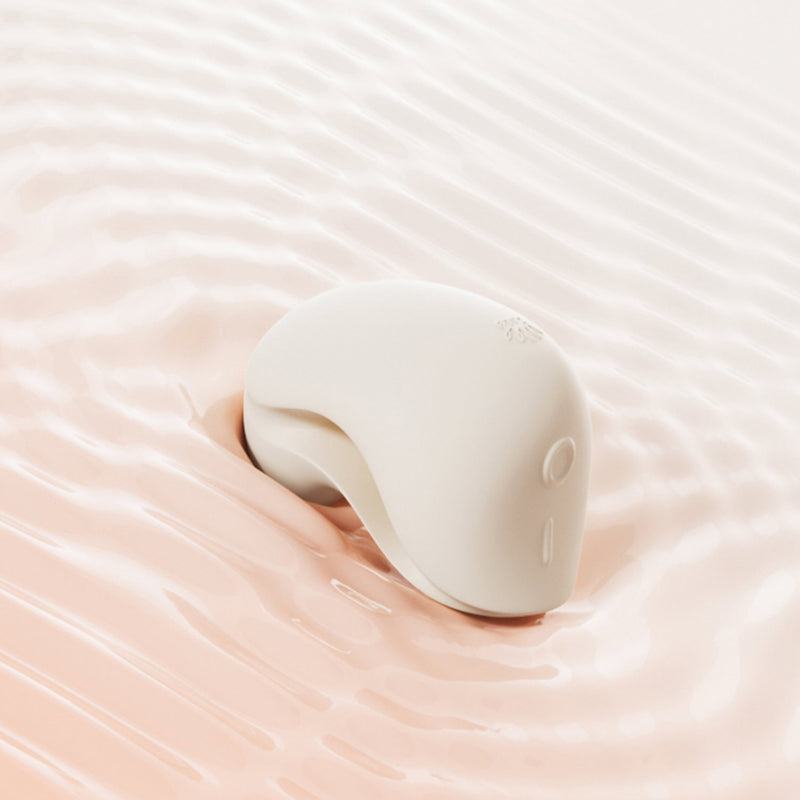 Zalo - Mochi - Vibrador para el clítoris con dos cabezales - Control mediante aplicación - Blanco marfil - Erotiekvoordeel.nl