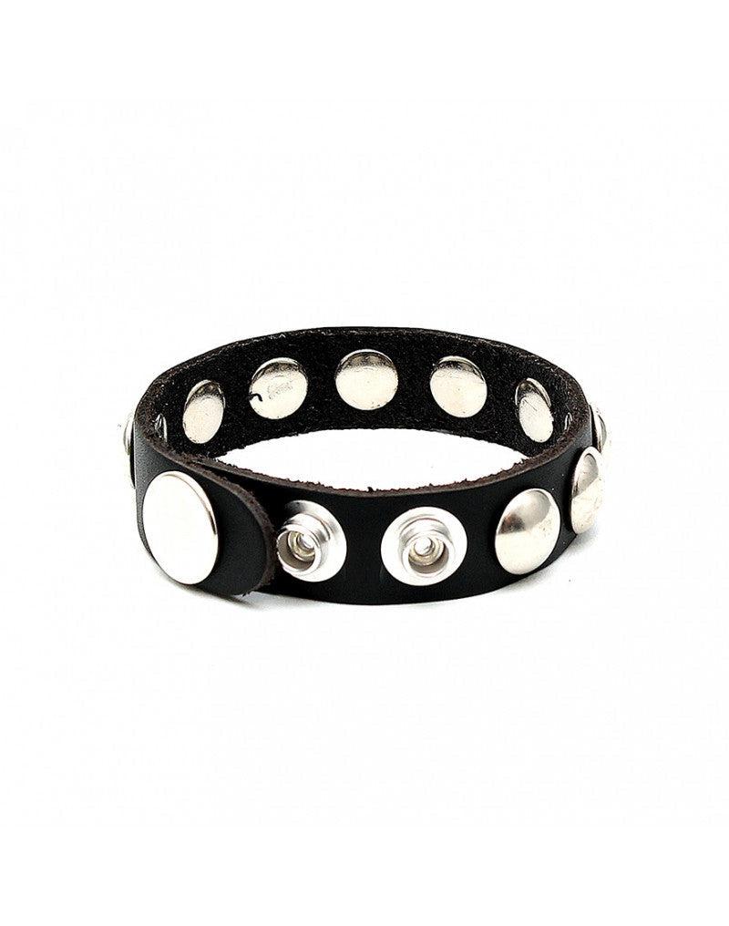 Rimba - Anello fallico in pelle con borchie decorative - Regolabile con bottoni a pressione - Nero-Erotiekvoordeel.nl
