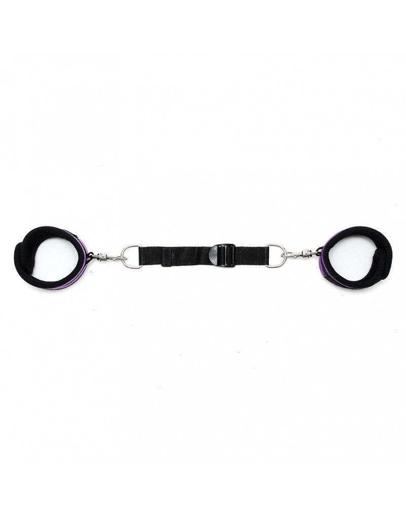 Rimba - Soft-Bondage-Fußfesseln mit Spreizband - Schwarz/Lila - Erotiekvoordeel.nl